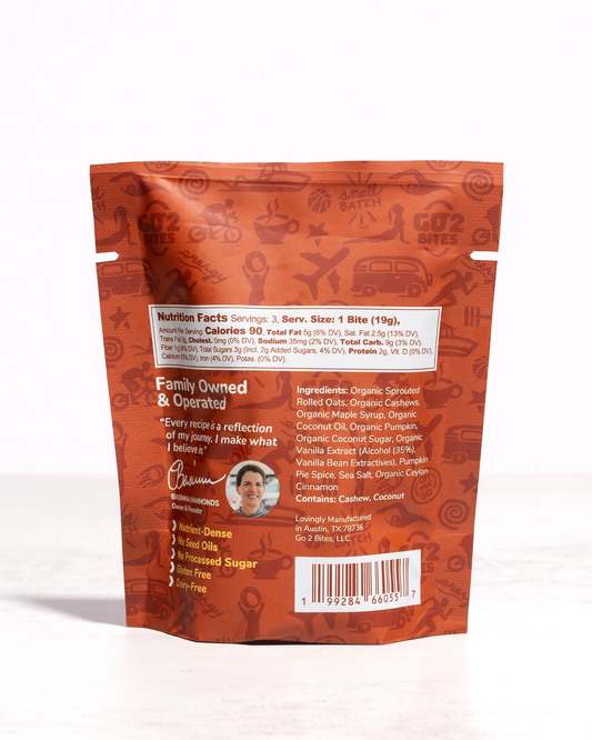 Back view of a snack package with branding and nutritional information on a white background