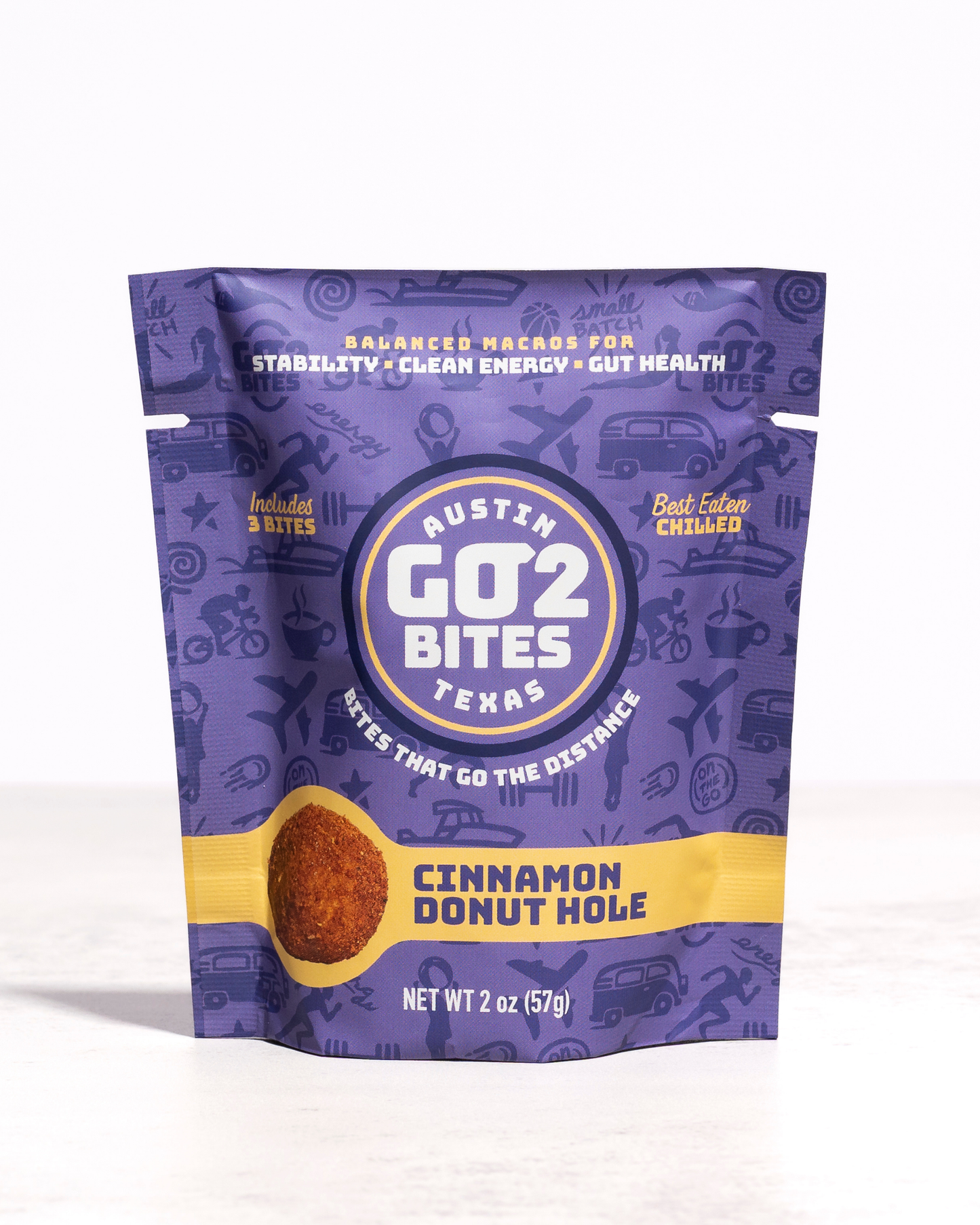Purple package of Austin Go2 Bites Cinnamon Donut Hole flavor on a white background